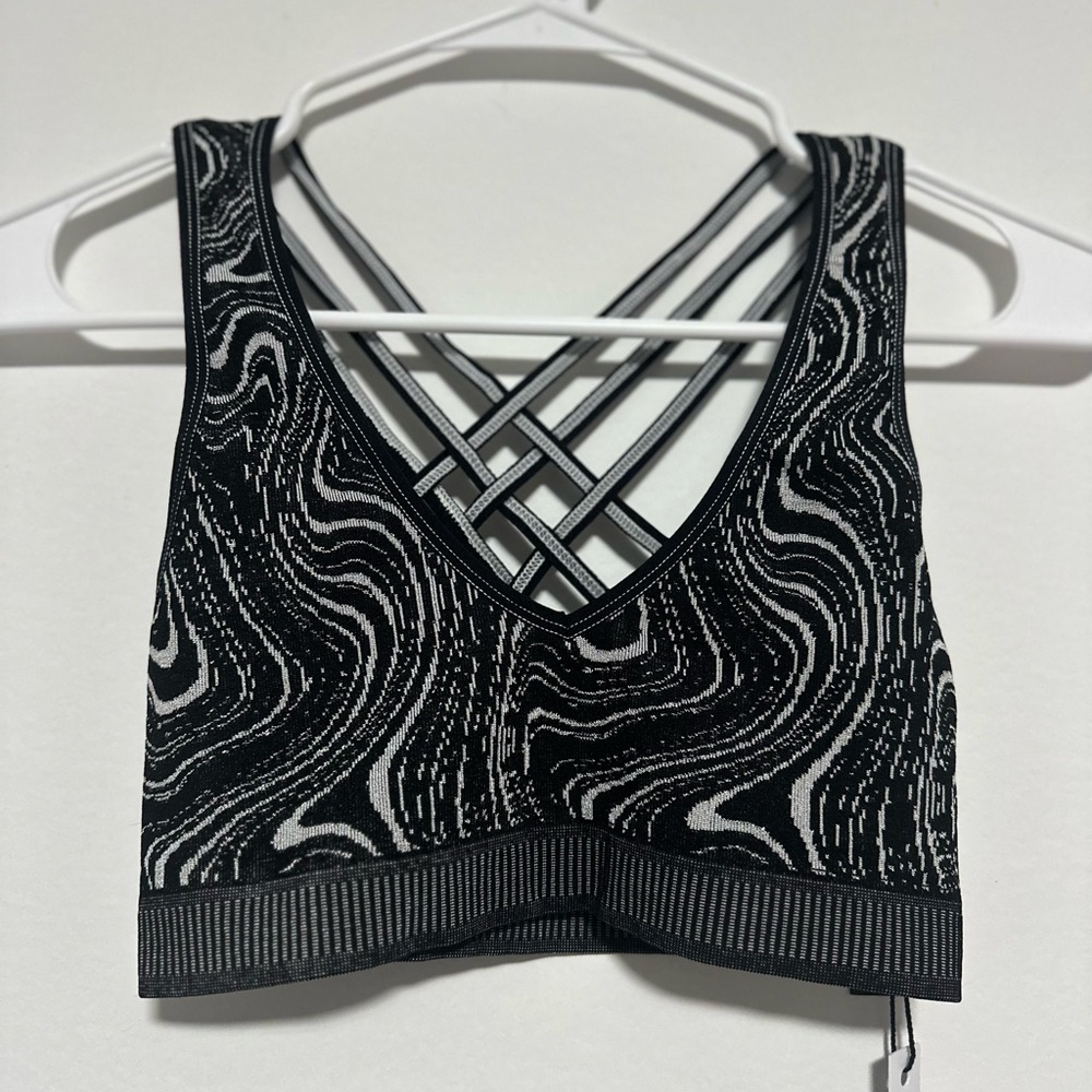 ASOS 4505 Seamless jacquard longline light support sports bra in swirl print